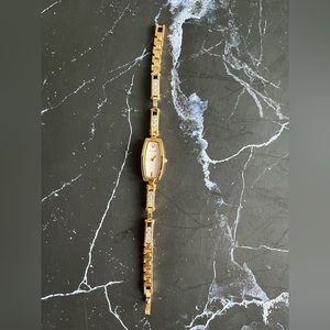 Bulova yellow gold and crystal watch - women